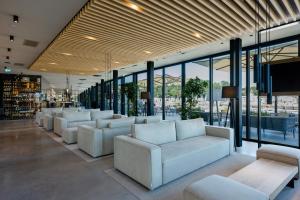 Гостиная зона в Lino delle Fate Eco Resort