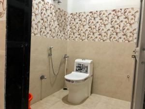 Ванна кімната в BHAI BHAI GUEST HOUSE