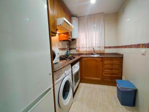 A kitchen or kitchenette at ACV - Costa Marina I-1ª linea planta 2 sur