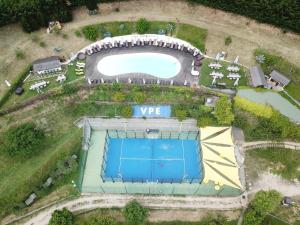 an aerial view of a swimming pool in a park at Agriturismo Villa Paradiso Esotico in Città di Castello