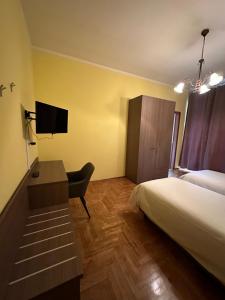 TV a/nebo společenská místnost v ubytování Albergo LA COLDRA