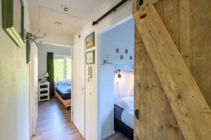 Postel nebo postele na pokoji v ubytování Luxe en comfort aan bos - geniet van rust & natuur