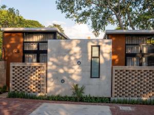 a rendering of a house with a tree at Brooklyn Blok in Pretoria
