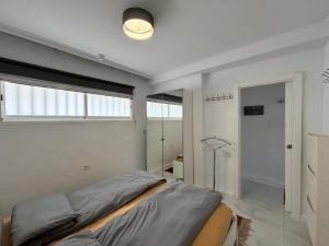 A bed or beds in a room at Teror 503