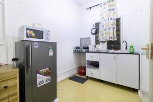 Η κουζίνα ή μικρή κουζίνα στο EUNICE'S CLASSY DIANI STUDIO