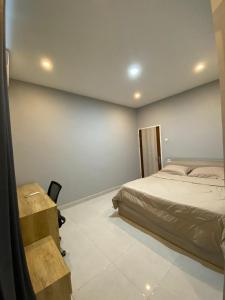 Postel nebo postele na pokoji v ubytování Sukha homestay