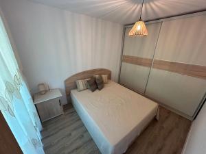 Postel nebo postele na pokoji v ubytování Sunrise Apart Golden Sands