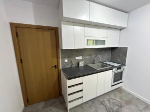 Kuchyň nebo kuchyňský kout v ubytování Sunrise Apart Golden Sands