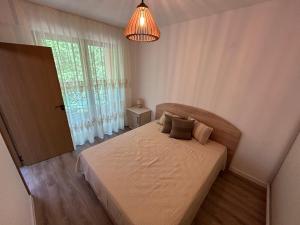 Postel nebo postele na pokoji v ubytování Sunrise Apart Golden Sands