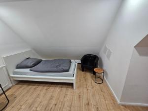 Ένα ή περισσότερα κρεβάτια σε δωμάτιο στο Weser Apartment +3 φωτογραφίες