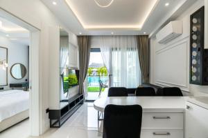 Postel nebo postele na pokoji v ubytování Edem Apartments