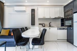 Kuchyň nebo kuchyňský kout v ubytování Edem Apartments