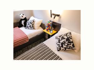 Postel nebo postele na pokoji v ubytování Ibis Styles Clermont-Ferrand République