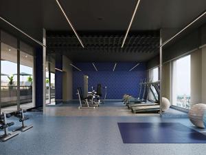 a gym with treadmills and machines in a room at Novotel Lubumbashi in Lubumbashi