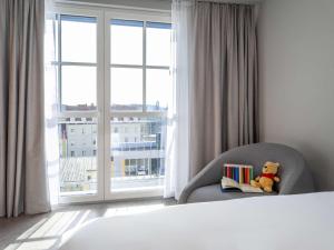 Letto o letti in una camera di ibis Styles Graz Messe