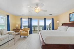 En eller flere senge i et værelse på Labacoco East