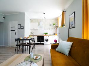 Kuchyňa alebo kuchynka v ubytovaní Apartamenty KDN na Rysiej