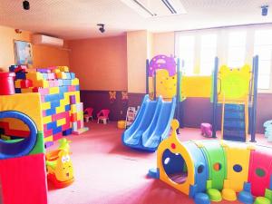 a play room with many different types of play equipment at Ikaho Kids Paradise Hotel - Vacation STAY 56072v in Shibukawa