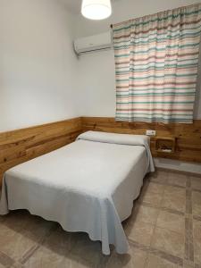 Postel nebo postele na pokoji v ubytování Hostal Barbate
