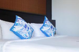 Ein Bett oder Betten in einem Zimmer der Unterkunft Koh Chang Grandview Resort