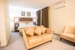 Krevet ili kreveti u jedinici u okviru objekta Jogor Hotel Ibadan