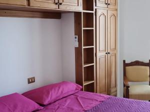 Ένα ή περισσότερα κρεβάτια σε δωμάτιο στο Appartamento climatizzato Alechome +13 φωτογραφίες