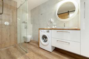 Ванна кімната в Dom Gościnny Amber Dziwnów - apartamenty i pokoje