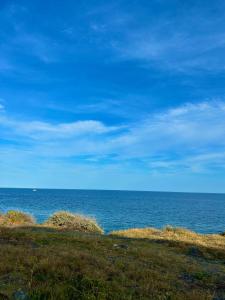 a view of the ocean on a sunny day at Beatrice's House in Catania