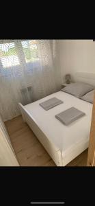 Cama o camas de una habitación en Apartments Stinjan