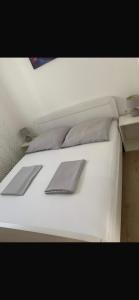 Cama o camas de una habitación en Apartments Stinjan
