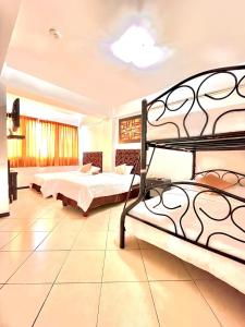 Voodi või voodid majutusasutuse Hotel Presidente Beach Salinas toas