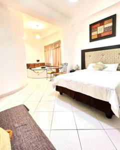Voodi või voodid majutusasutuse Hotel Presidente Beach Salinas toas
