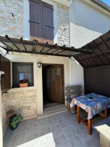 Stolní tenis v ubytování Apartman Ajhner nebo okolí