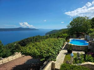 a view of the lake from a house at Kuća za odmor Ameli in Mošćenička Draga