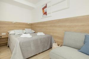 Posteľ alebo postele v izbe v ubytovaní AMBER DZIWNÓW - Pokoje i Apartamenty & SPA