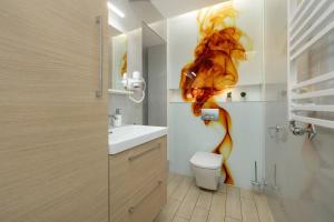 Kúpeľňa v ubytovaní AMBER DZIWNÓW - Pokoje i Apartamenty & SPA