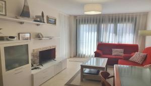 Televisyen dan/atau pusat hiburan di Apartamento "sanse"