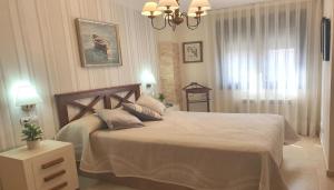 Katil atau katil-katil dalam bilik di Apartamento "sanse" +9 gambar