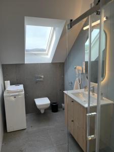 Koupelna v ubytování Apartamenty Nad Jeziorem