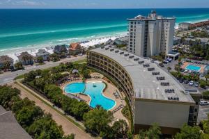an aerial view of a hotel and the beach at Beach Resort 214 in Destin