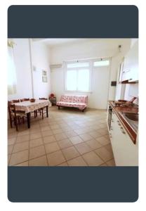 Postel nebo postele na pokoji v ubytování La casina del mare + 1 fotografie