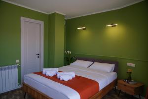 Postel nebo postele na pokoji v ubytování Station 22 Hotel