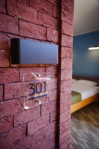 Postel nebo postele na pokoji v ubytování Station 22 Hotel