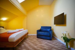 Postel nebo postele na pokoji v ubytování Station 22 Hotel