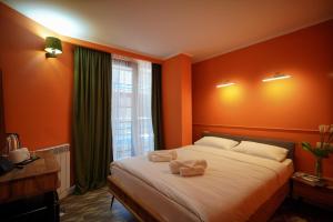 Postel nebo postele na pokoji v ubytování Station 22 Hotel