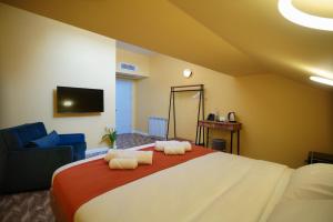 Postel nebo postele na pokoji v ubytování Station 22 Hotel