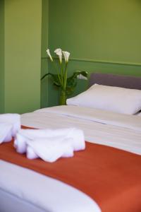 Postel nebo postele na pokoji v ubytování Station 22 Hotel