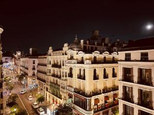 Nespecifikovaný výhled na destinaci Madrid nebo výhled na město při pohledu z penzionu