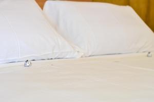 Postel nebo postele na pokoji v ubytování Blumarea