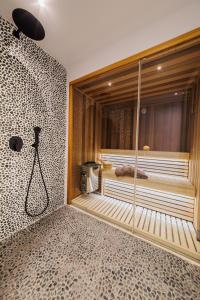 a room with a large shower in a room at Gialova Hills Luxury Villas with Private Pool in Gialova